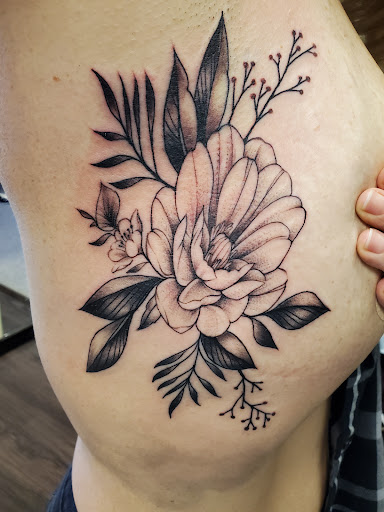 Find sleeve tattoo ideas womens for your next unique tattoo in Peoria at Guerrilla Ink Tattoos