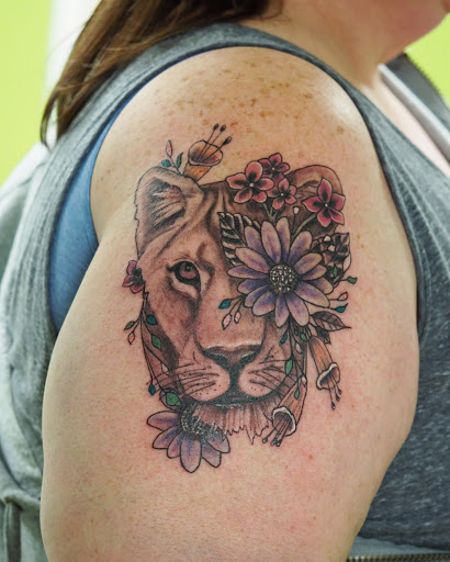 Explore jersey tattoo ideas, creative tattoo ideas in Springfield, available at Poke and a Rub art studio