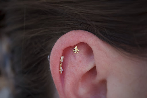 Explore campfire tattoo ideas, creative tattoo ideas in Corona Del Mar, available at Rainbow Piercing & Jewelry