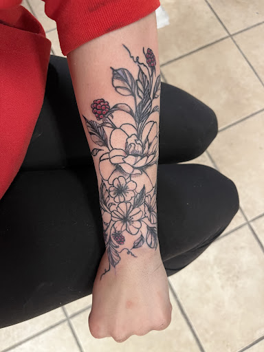 Explore female arm tattoo ideas, creative tattoo ideas in Rhinelander, available at Filling The VOID Tattoo Studio