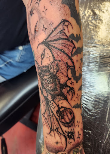 Explore bear sleeve tattoo ideas, creative tattoo ideas in Inverness, available at The Perfect Spot Tattoos