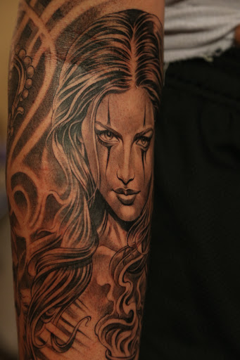 Find tattoo ideas for breast for your next unique tattoo in Fountain Valley at Lowrider Tattoo Studios