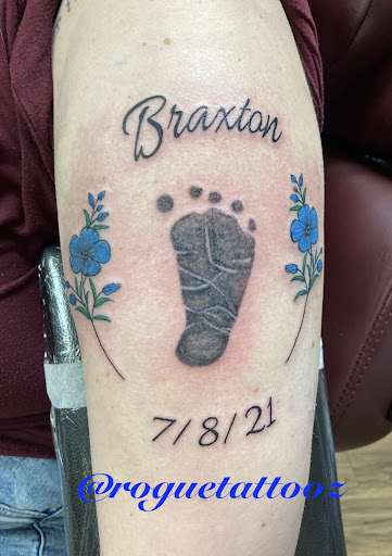 Explore mens space tattoo ideas, creative tattoo ideas in Bristol, available at Rogue Tattoos