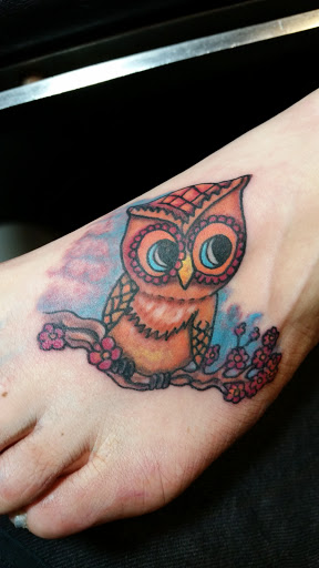 Explore armband tattoo ideas for men, creative tattoo ideas in Erie, available at EliKingInk