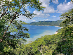 Foto di Tapustxunya Beach con una costa spaziosa