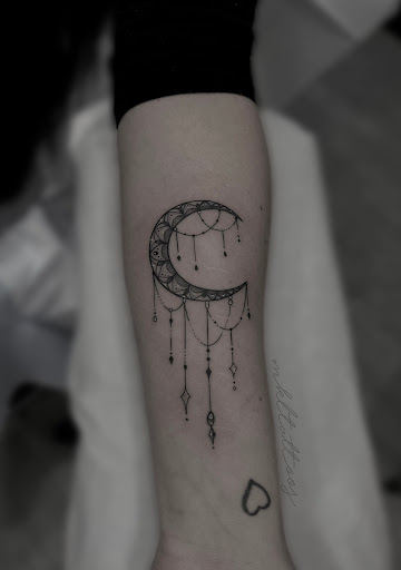 Explore surfing tattoo ideas, creative tattoo ideas in Nashville, available at Mel Lockett Tattoos