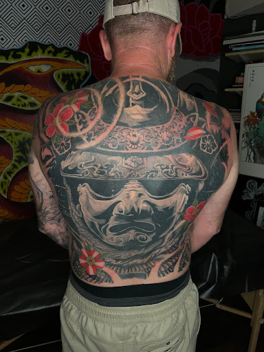 Find tattoo ideas for a mom for your next unique tattoo in North Charleston at Breakthrough Tattoo