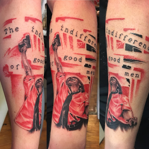 Explore adventurer tattoo ideas, creative tattoo ideas in Milford, available at Golden Hammer Tattoo Studios