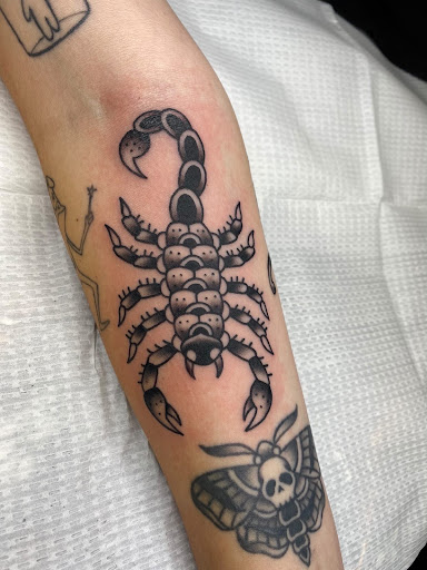 Explore cross tattoo ideas for women, creative tattoo ideas in Fort Collins, available at Area 69 Tattoo