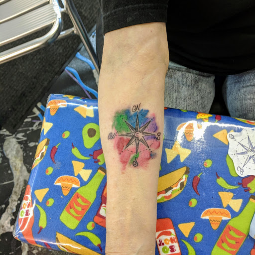Explore small floral tattoo ideas, creative tattoo ideas in Redding, available at Caddy Daddys