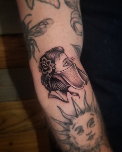 Explore spine tattoo ideas, creative tattoo ideas in Talbott, available at Alpha Tattoo co.