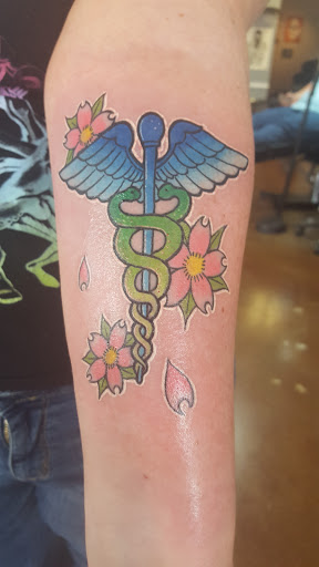 Explore tattoo cover up ideas women, creative tattoo ideas in Arlington, available at Urbans Tattoo & Piercing Studio