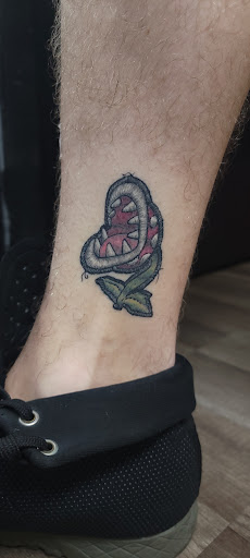 Explore simple beach tattoo ideas, creative tattoo ideas in Largo, available at Alchemy Tattoos and Body Piercings