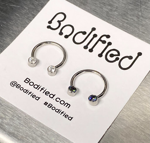 Explore patchwork sleeve tattoo ideas, creative tattoo ideas in Oswego, available at Bodified