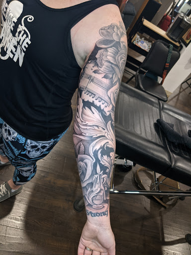 Explore circle of life tattoo ideas, creative tattoo ideas in Grand Junction, available at Monarch Tattoo Studio