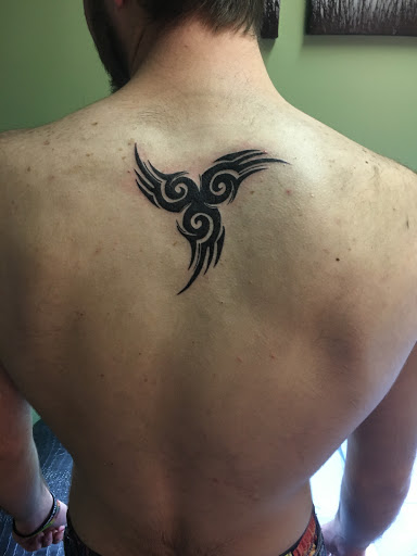 Explore tattoo ideas for october, creative tattoo ideas in Kingsford, available at Deft Tattoo Studio
