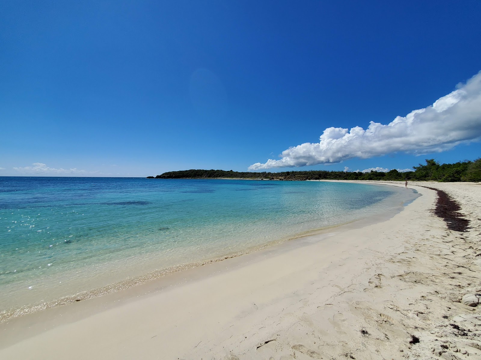 Secret beach的照片 带有白沙表面