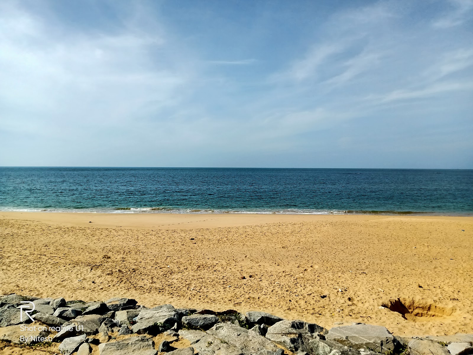 Lighthouse Beach的照片 带有碧绿色水表面