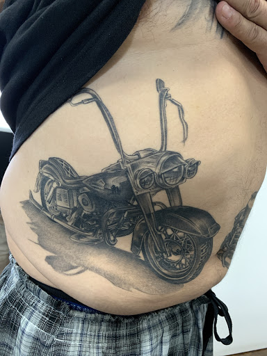 Explore arm blackout tattoo ideas, creative tattoo ideas in Lancaster, available at DEADMANS STUDIO