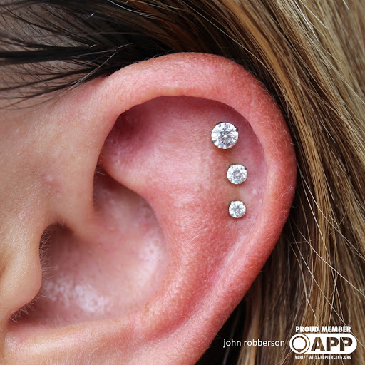 Explore floral sleeve tattoo ideas, creative tattoo ideas in Fort Myers, available at Tiger Lotus Tattoo and Piercing