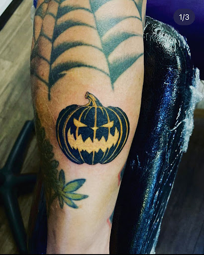 Explore rosary tattoo ideas, creative tattoo ideas in Cheyenne, available at The T.R.I.B.E. Zoo, LLC Tattoo