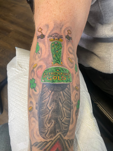 Explore small tattoo ideas for lower back, creative tattoo ideas in Forest Lake, available at Electric Blue Tattoo Co.