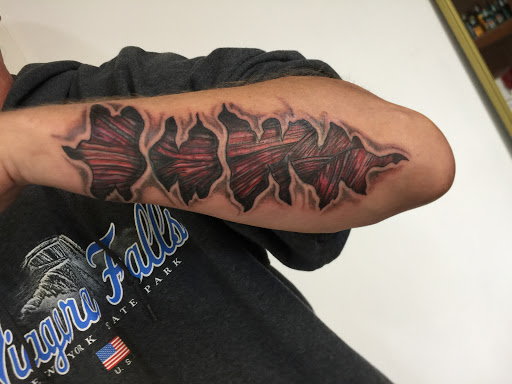 Explore full neck tattoos ideas, creative tattoo ideas in Butler, available at Kryptic Skin Tattoo