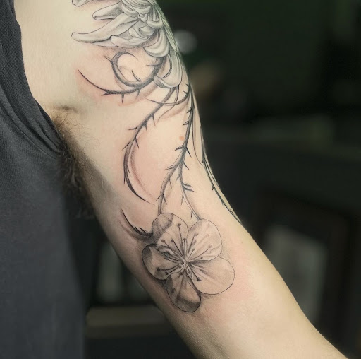 Explore cyber y2k tattoo ideas, creative tattoo ideas in Peoria, available at Modern Ink Tattoo