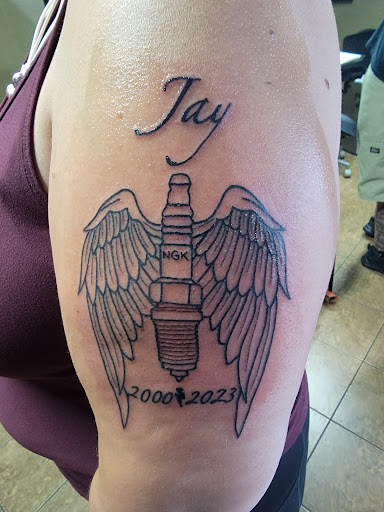 Explore behind ear tattoo ideas, creative tattoo ideas in Copperas Cove, available at Black Moon Tattoo Company