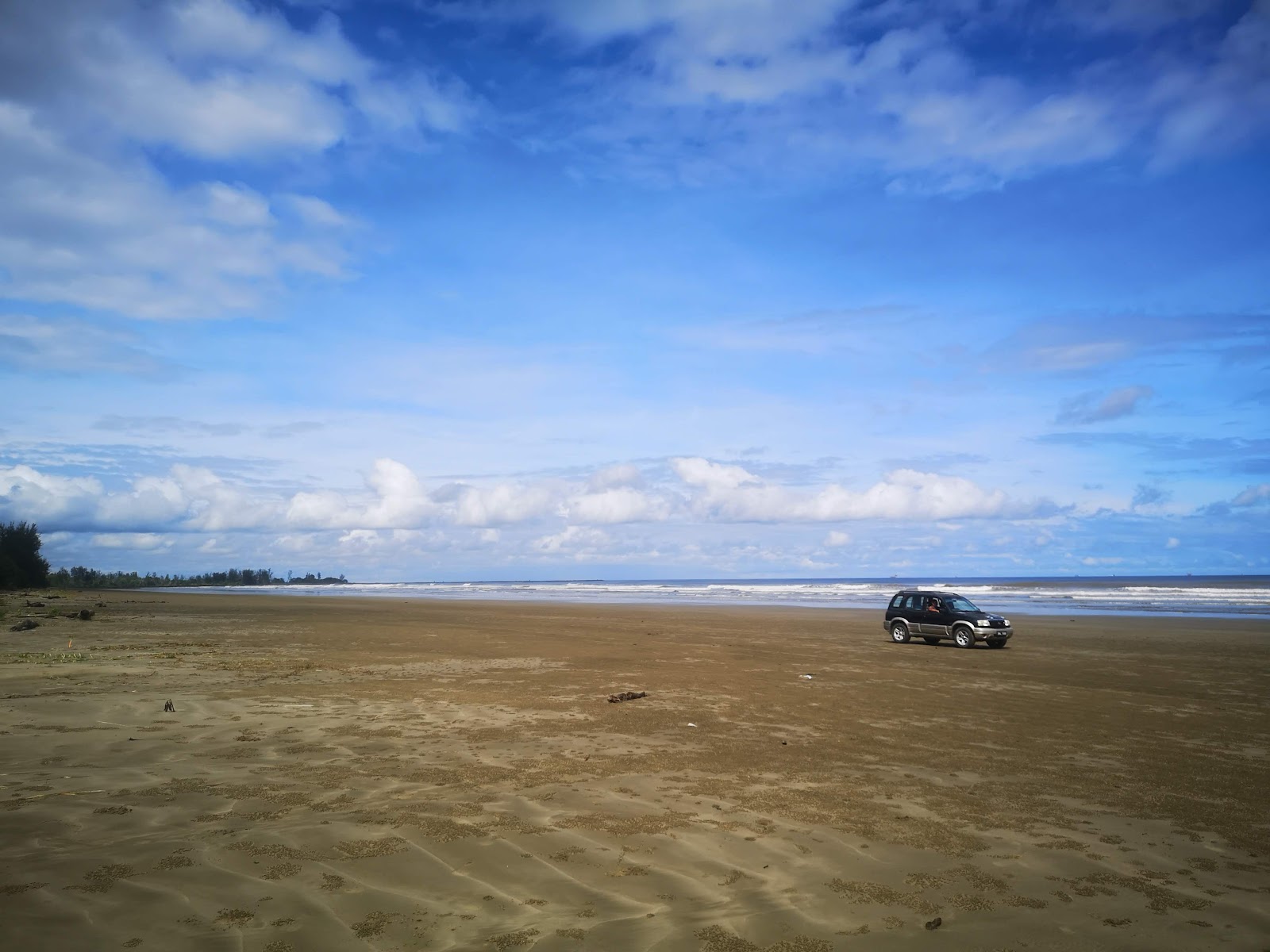 Belait Beach的照片 具有部分干净级别的清洁度