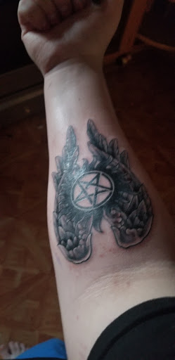 Explore mens simple tattoo ideas, creative tattoo ideas in Rockford, available at Delicious Ink Tattoo & Piercing