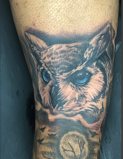 Explore throat tattoo ideas, creative tattoo ideas in Starkville, available at Xclusive Ink Tattoo Company