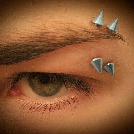 Explore wedding ring tattoo ideas for him, creative tattoo ideas in Elko, available at Tom Custom Tattoos and Body Piercing Studio