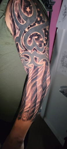 Explore calf tattoo ideas for females, creative tattoo ideas in Angola, available at Hoodlum Ink