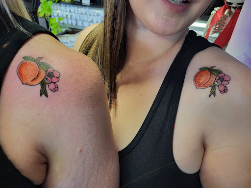 Explore western sleeve tattoo ideas, creative tattoo ideas in Hinesville, available at Ink Survivor Tattoo & Piercing