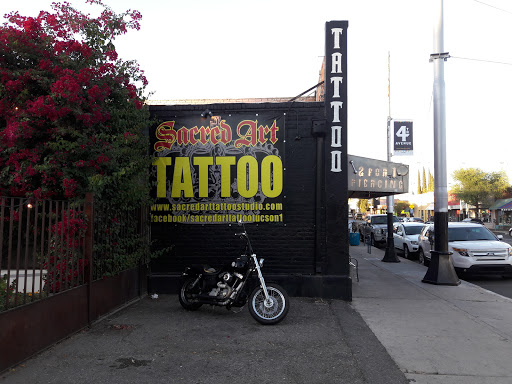 Explore cool face tattoos ideas, creative tattoo ideas in Tucson, available at Sacred Art Tattoo Studio