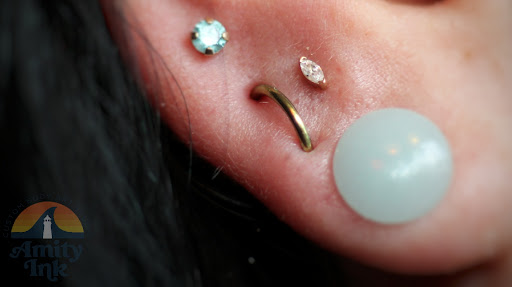 Explore squid tattoo ideas, creative tattoo ideas in Toledo, available at Piercings by Caitlin presents Holier Toledo