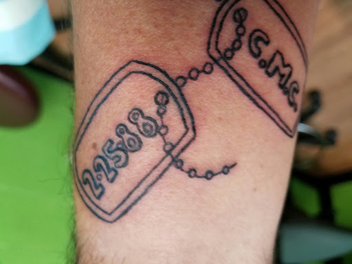 Explore female neck tattoo ideas, creative tattoo ideas in Valdosta, available at Hollywood Twisted Needles