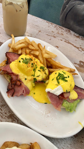 Eggs Benedict w/avocado & fries