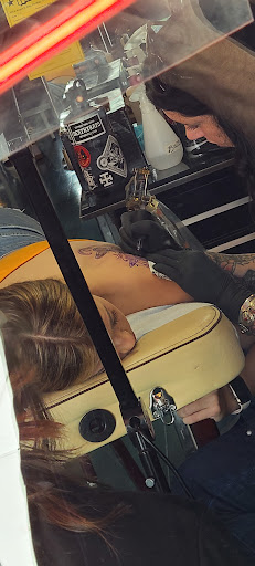 Explore front of neck tattoo ideas, creative tattoo ideas in Reno, available at Aces Tattoo