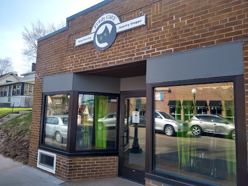 Find goth tattoo ideas for men for your next unique tattoo in Saint Paul at Fraidy Cats Professional Body Piercing