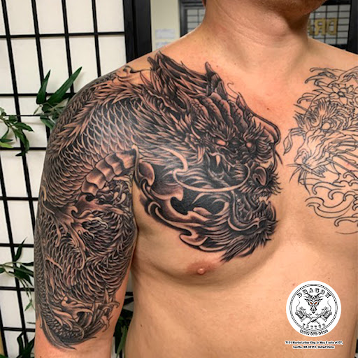 Explore chicano sleeve tattoo ideas, creative tattoo ideas in Seattle, available at Dragon Tattoo