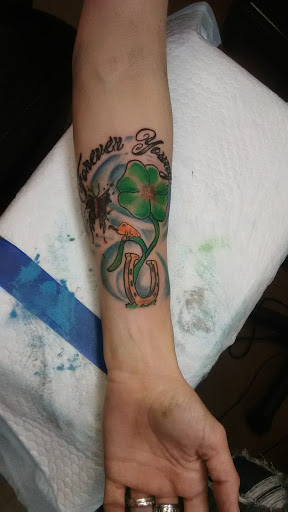 Explore feminine hand tattoo ideas, creative tattoo ideas in Little Rock, available at Catfish Jimmys Tattoo Shop