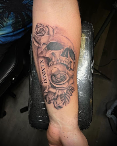 Explore cover up lower back tattoo ideas, creative tattoo ideas in Peoria, available at Modern Ink Tattoo