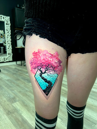 Explore men's neck tattoo ideas, creative tattoo ideas in Mesa, available at Next Wave Tattoos and Piercings