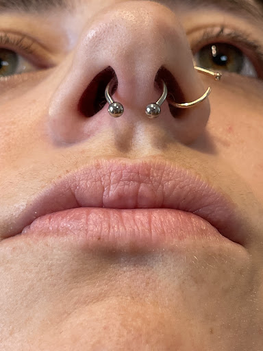 Explore lower arm tattoo ideas, creative tattoo ideas in Chapel Hill, available at Golden Falcon Tattoo and Piercing