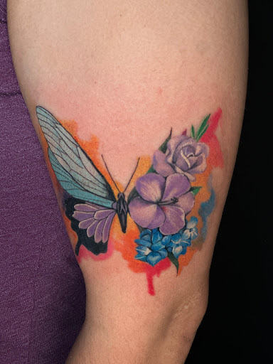 Explore back shoulder tattoo ideas for men, creative tattoo ideas in Norcross, available at Brotherhood Tattoo