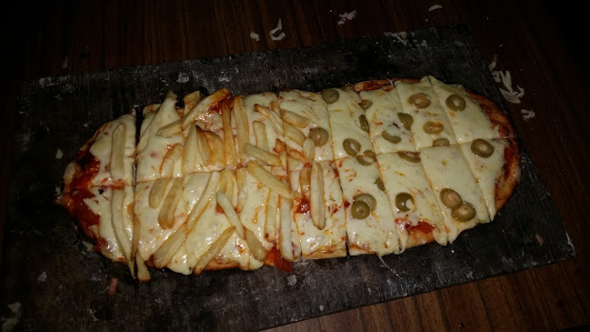 Opiniones de Pizzería Lo del Tyncho en Canelones - Restaurante