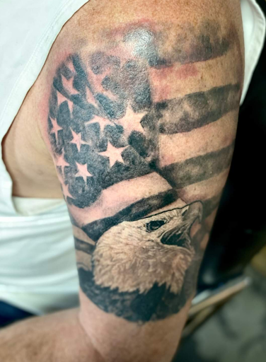 Explore lone wolf tattoo ideas, creative tattoo ideas in Bardstown, available at Artistic Resurrection Tattoo Bardstown