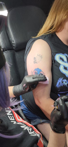 Explore orchid tattoo ideas, creative tattoo ideas in Lavonia, available at New Moon Tattoo LLC